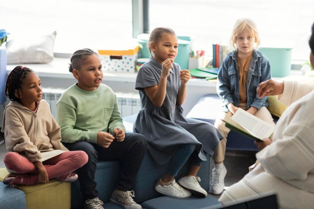 Kids developing listening skills through group storytime in a classroom