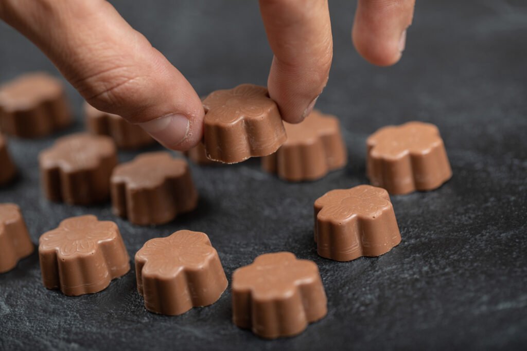 Timeline showing the history and evolution of the Milky Chocolate Bar from ancient cocoa to modern sweets