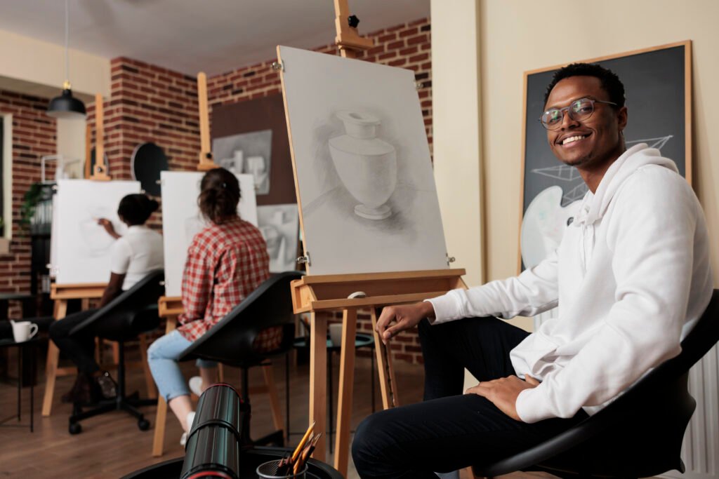 Diverse group of artists standing confidently before a large digital canvas, representing unity and creative inspiration