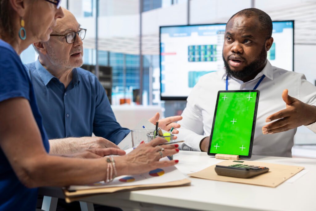 Employees engaging in gamified cognitive training challenges using CogniFit at the workplace.